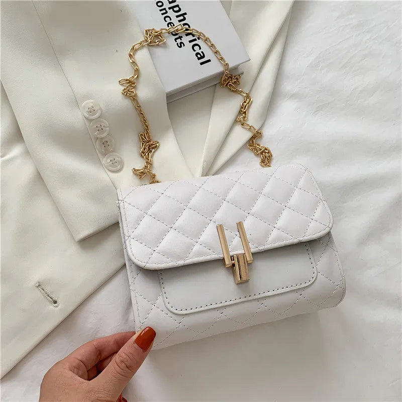 Women's crossbody bag with diamond lattice chain strap in black, white or green minimalist design