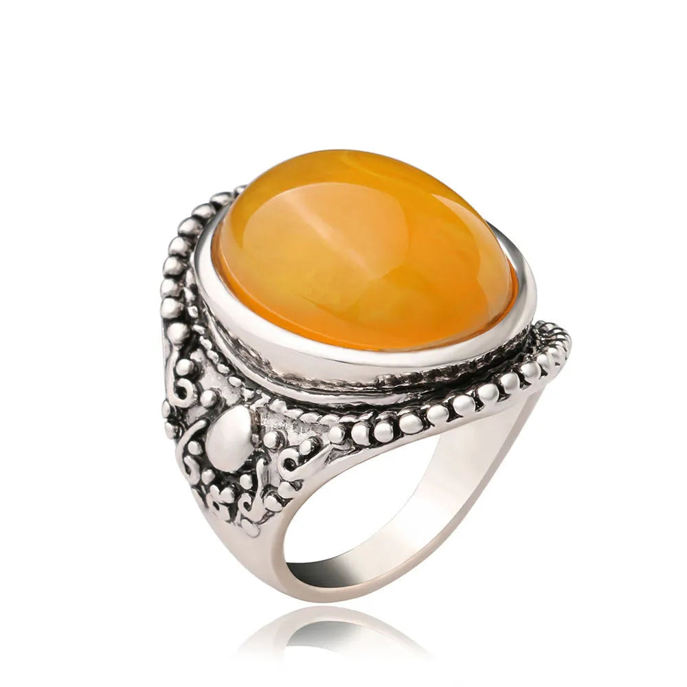 Geometric retro ring with fluorescent beeswax detailing on antique silver electroplated alloy