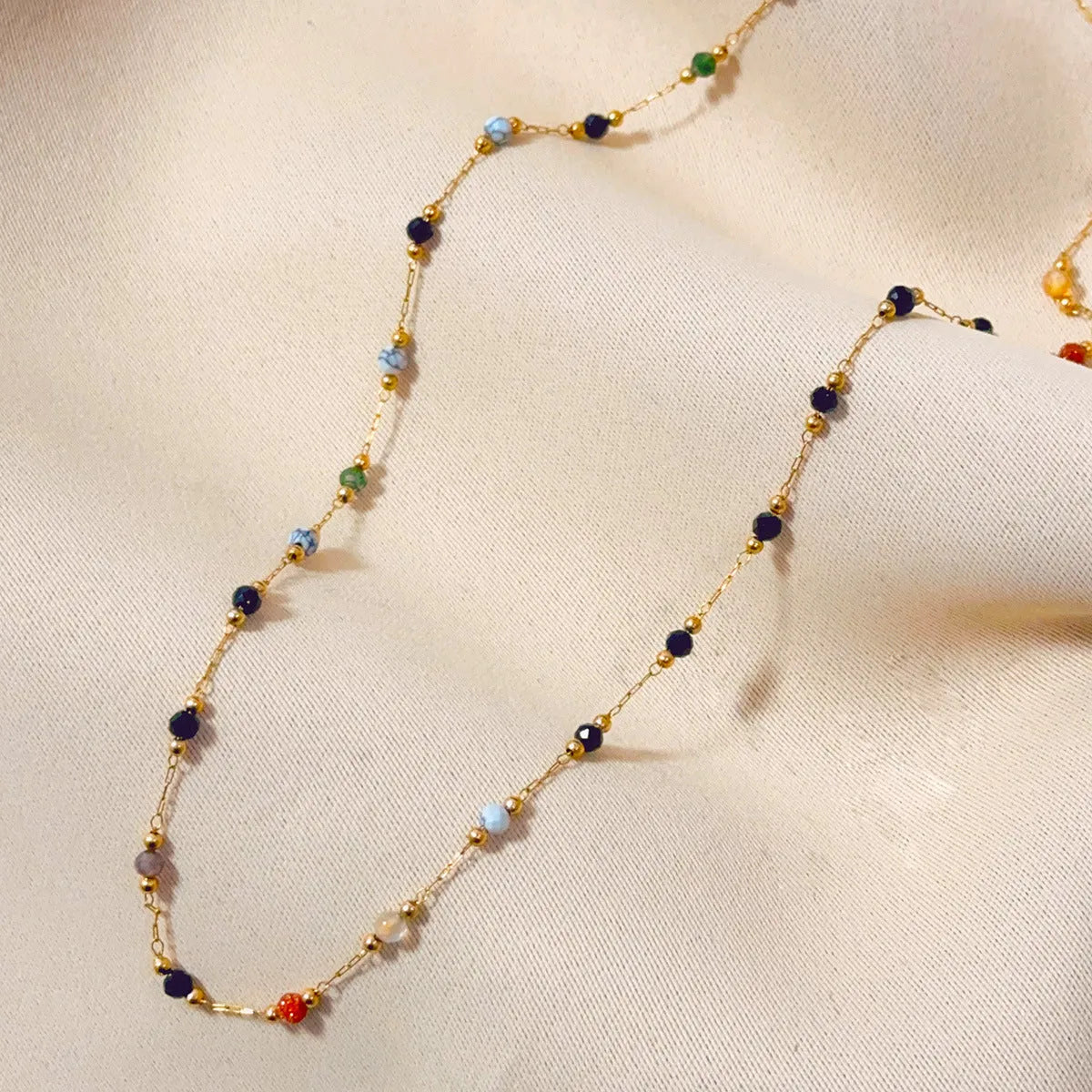 Women's titanium steel necklace with natural stone pendant in gold electroplated finish