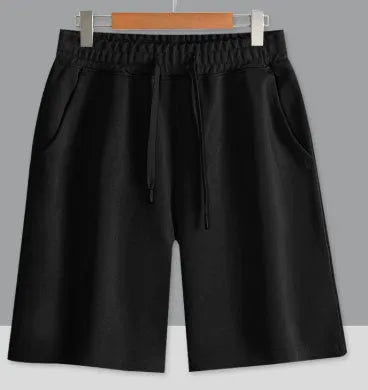 Straight-leg cotton sports shorts in light grey on a neutral background.