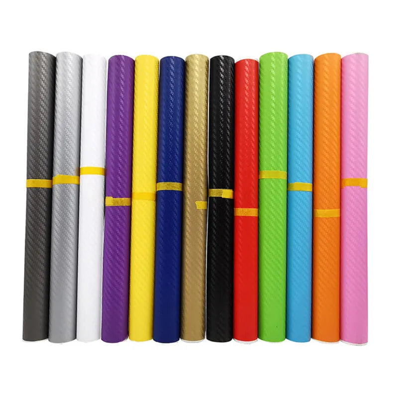 Roll of 3D carbon fibre car stickers showing textured pattern in multiple colour options
