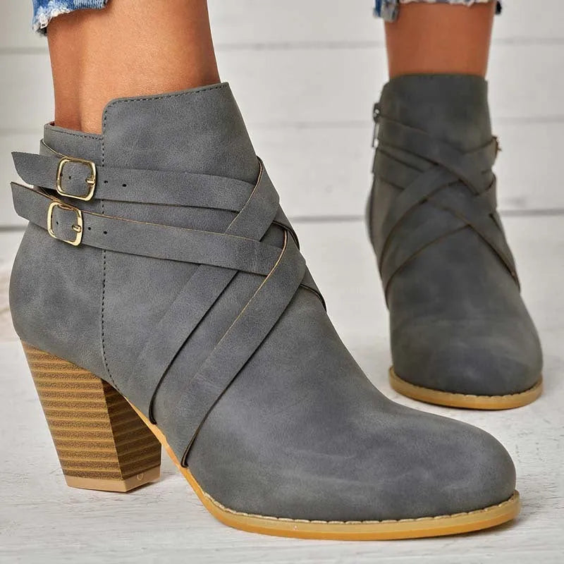 Grey plus size women's ankle boots with 7cm heel, side zip and belt buckle.