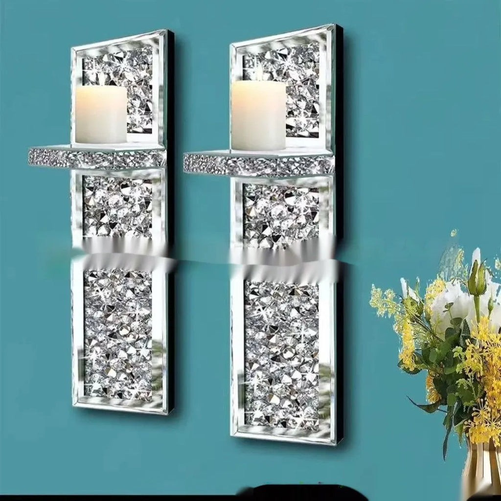 Silver mirror glass wall hanging candlestick pair measuring 38 cm tall