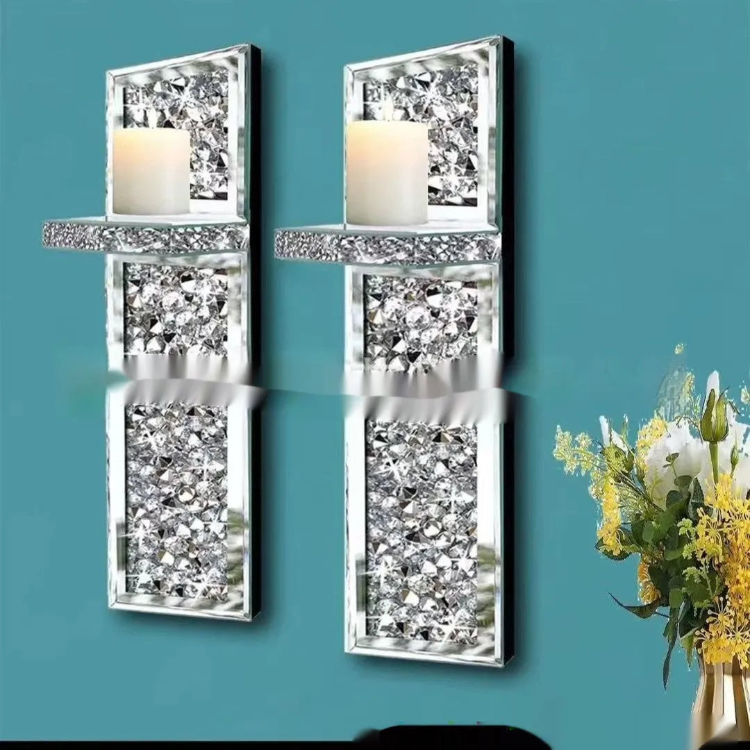 Silver mirror glass wall hanging candlestick pair measuring 38 cm tall