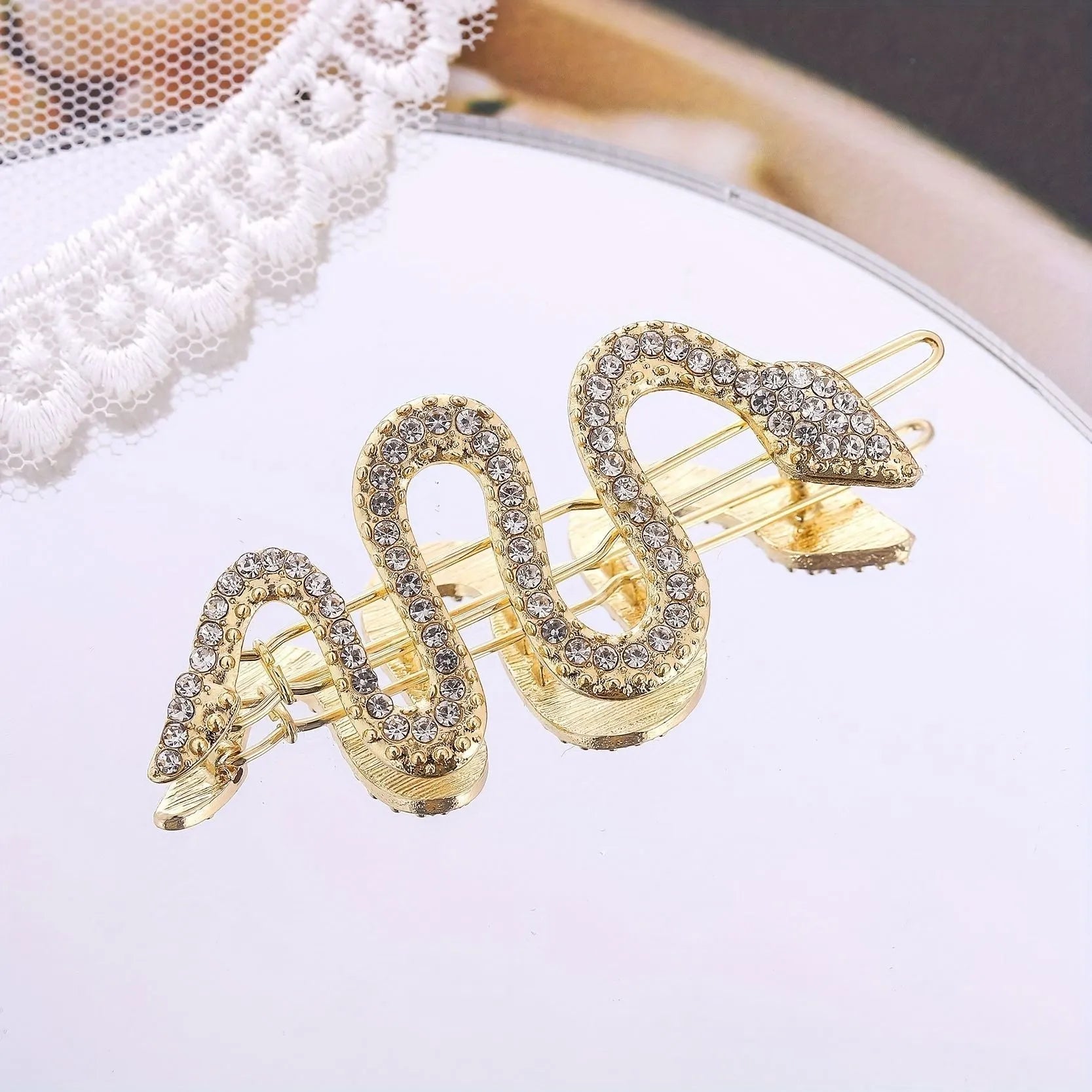 Vintage Korean-style snake design hair clip with rhinestones in gold or silver electroplated finish