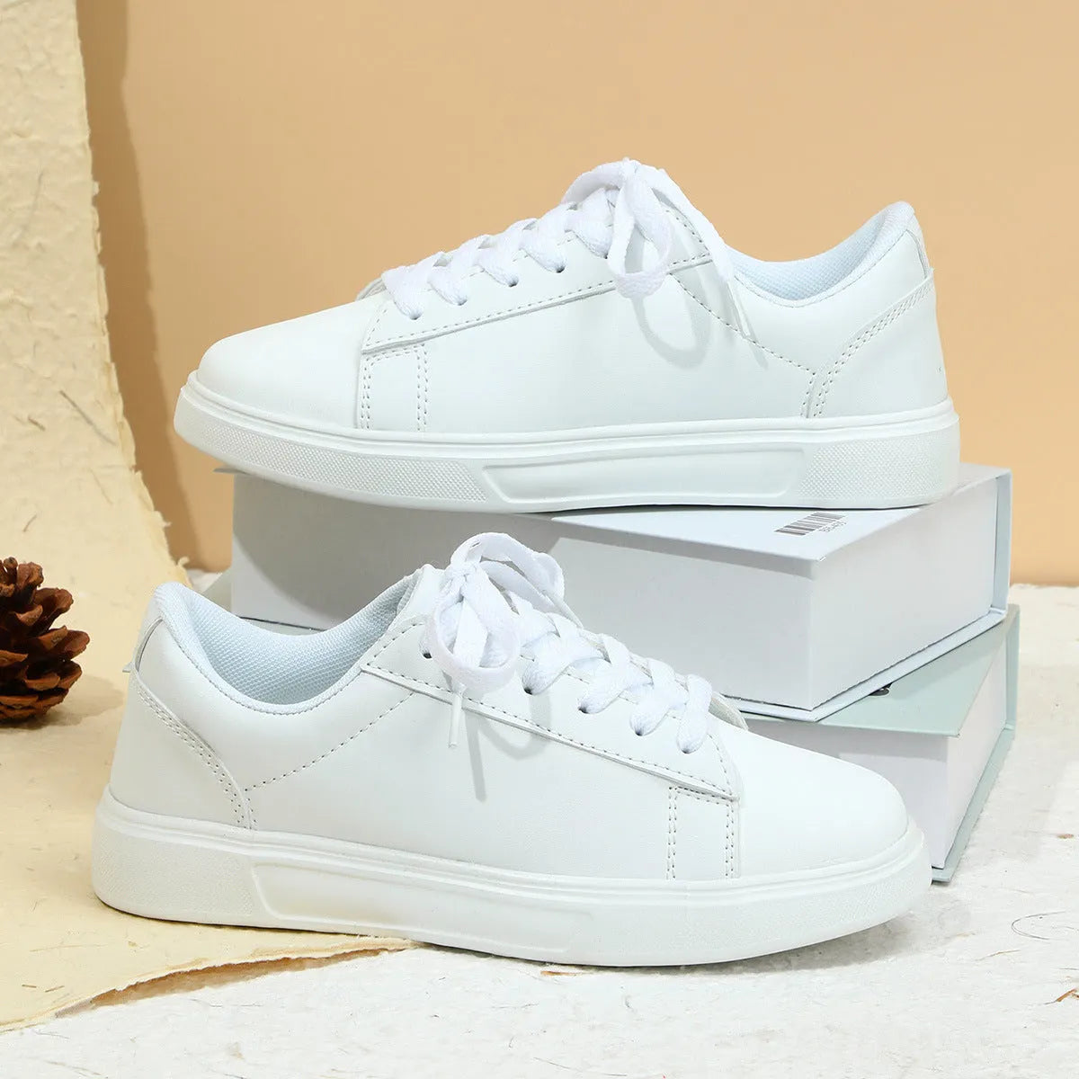 Platform skateboard sneakers in beige brown with round toe and shallow mouth design