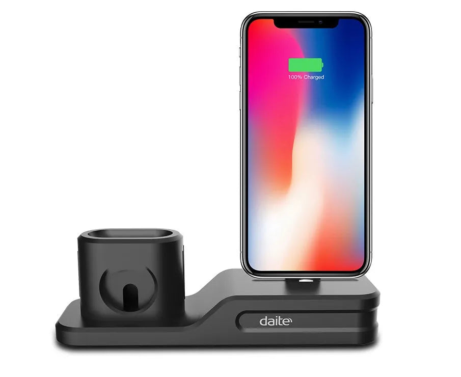 Black silicone 3-in-1 charging base for iPhone, iWatch, and AirPods on a plain surface