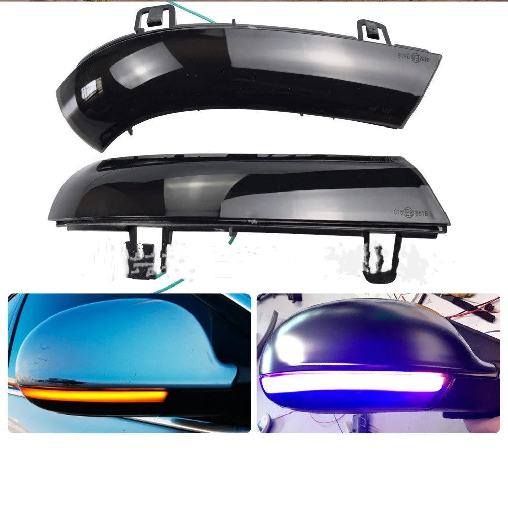 Volkswagen Golf MK5 front end with dynamic sequential amber and blue turn signal lights illuminated.