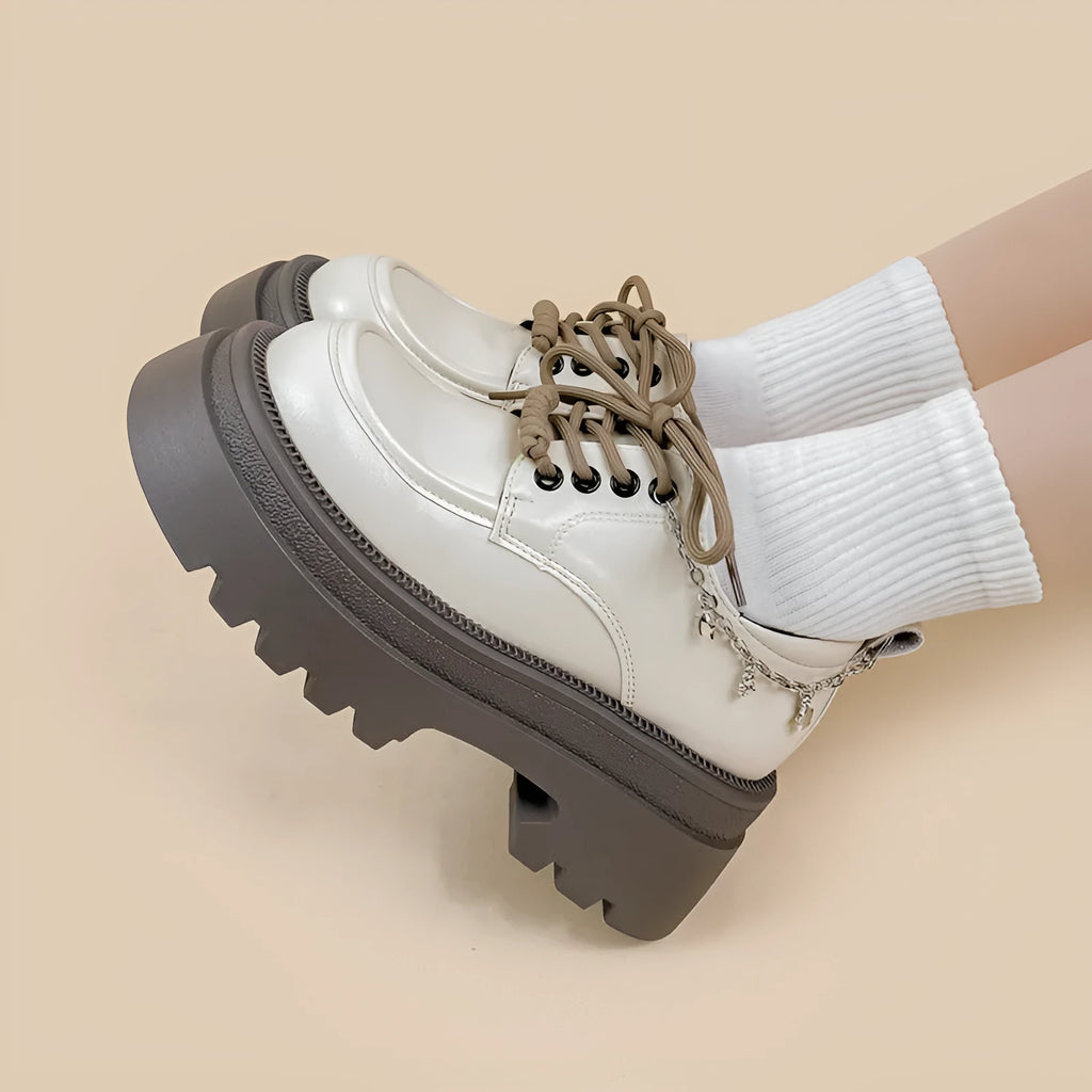 White platform leather shoes with chunky 6-8cm heels and Mary Jane style front lace-up design
