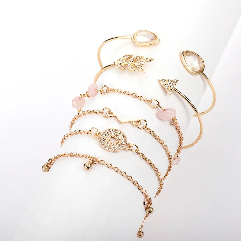 Golden spot drill arrow and water drop shaped bracelet set with six zinc alloy pieces