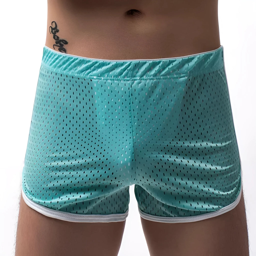 Men's knitted cotton three-point boxer shorts in black, grey, blue, and white colours laid flat.