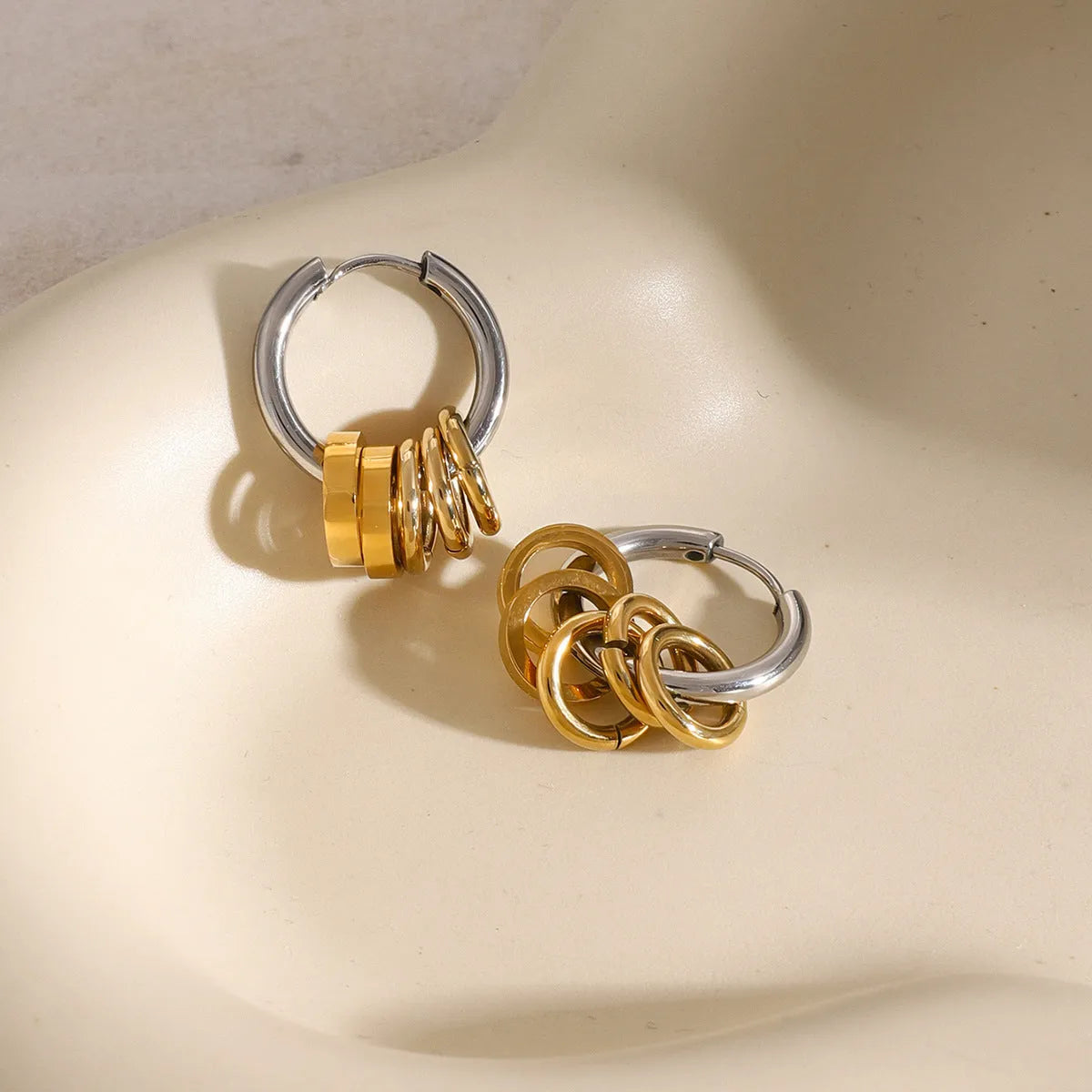Gold tone stainless steel earrings with electroplated finish in unisex ins style design