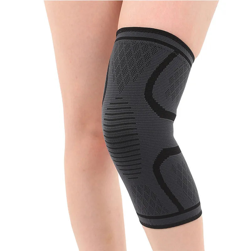 Double corrugated non-slip sports kneecaps in various colours on a grey background.