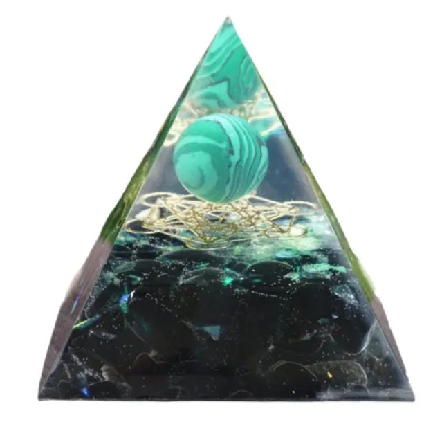 Clear epoxy resin pyramid ornament with embedded blue lapis lazuli crystal gravel, 6cm tall.