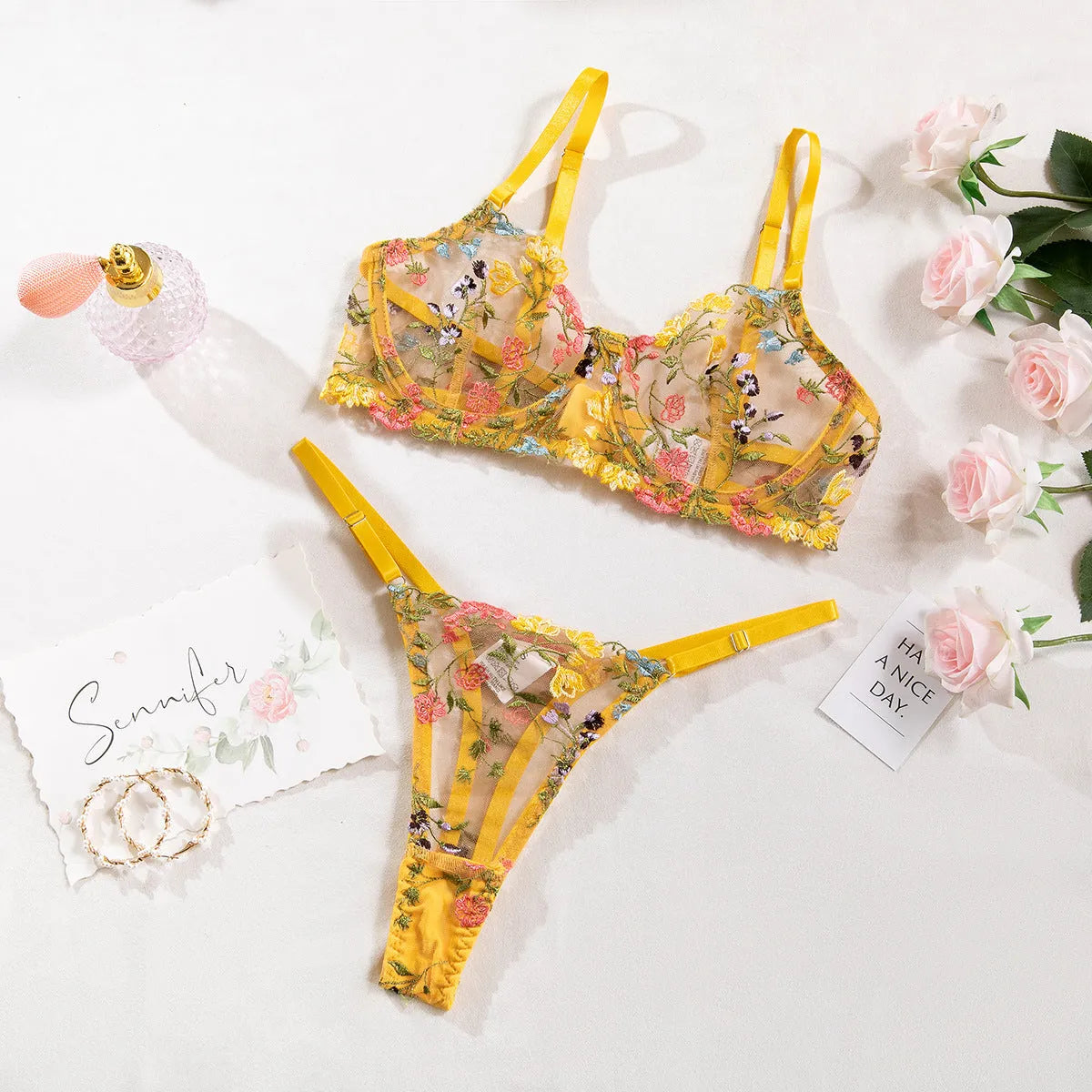 Floral mesh bra and T-back underwear set with steel ring detailing in skin colour option