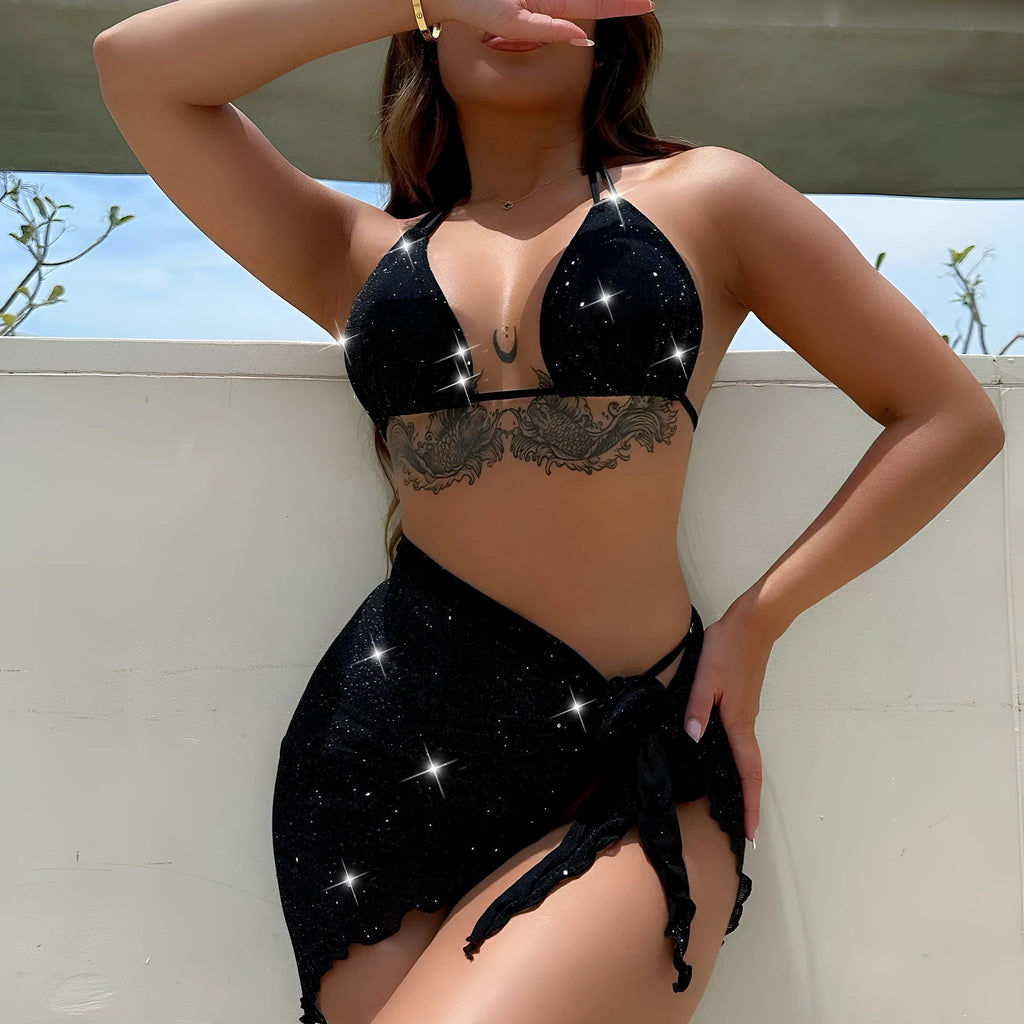 Black three-piece polyester bikini swimsuit set showing top and shorts.