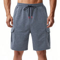 Heavy loose sports cargo shorts in towel terry fabric with multiple pockets in light grey colour