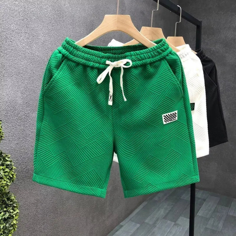 Casual solid-colour polyester sports shorts with micro elasticity on a mannequin.