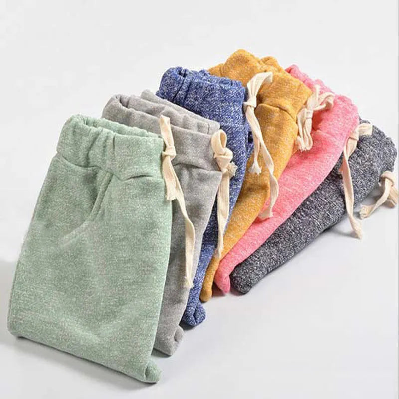 Fashion children cropped trousers for baby girls and boys, sizes 2T to 6, in blue colour.