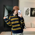 Yellow striped loose sweater for women with long sleeves, pullover design, polyester fabric