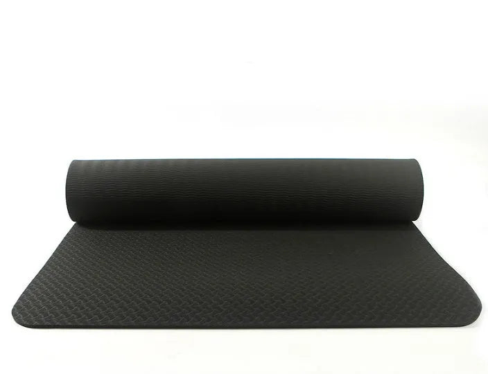 Pure colour EVA yoga brick, thick non-slip mat, and cotton tension band on a floor, in blue, purple, pink, red, black, gray
