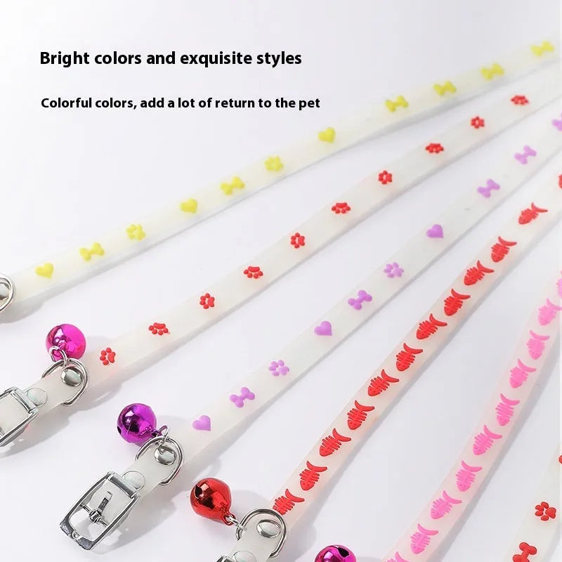 Adjustable luminous cat collar with silicone strap and metal bell in decorative pattern