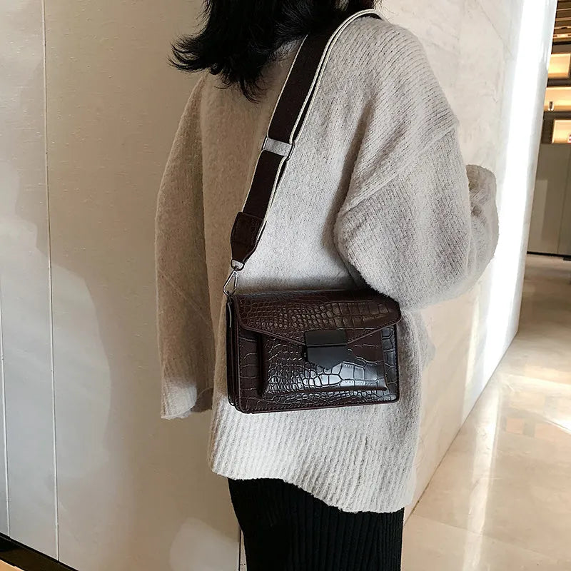 Vintage PU leather crossbody bag showing black, dark brown, khaki and red colour options