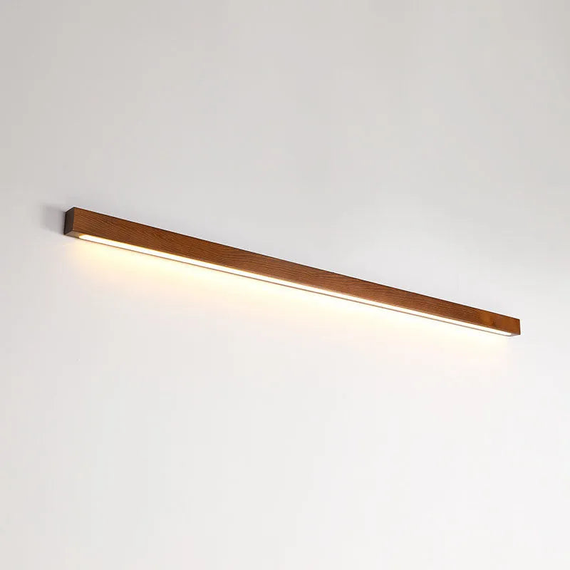 Walnut colour wood and acrylic LED strip wall lamp in modern minimalist design