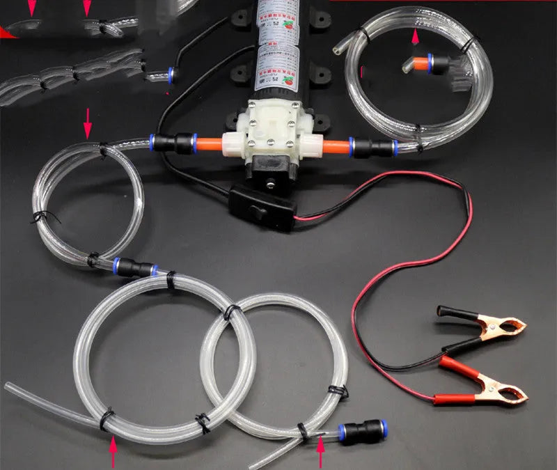 Self-priming electric oil changer with cigarette lighter plug and fish clip steel pipe