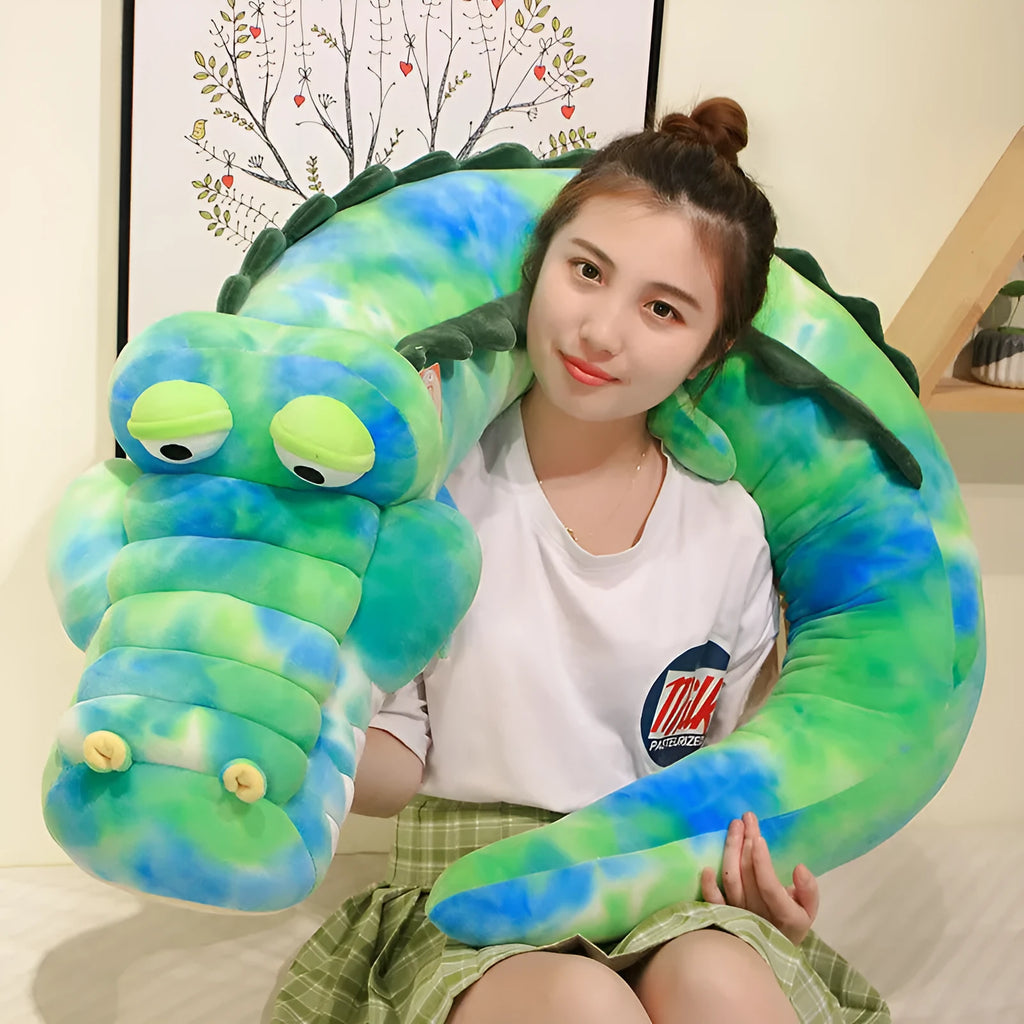 Symphony soft velvet alligator plush toy in green colour on a plain background