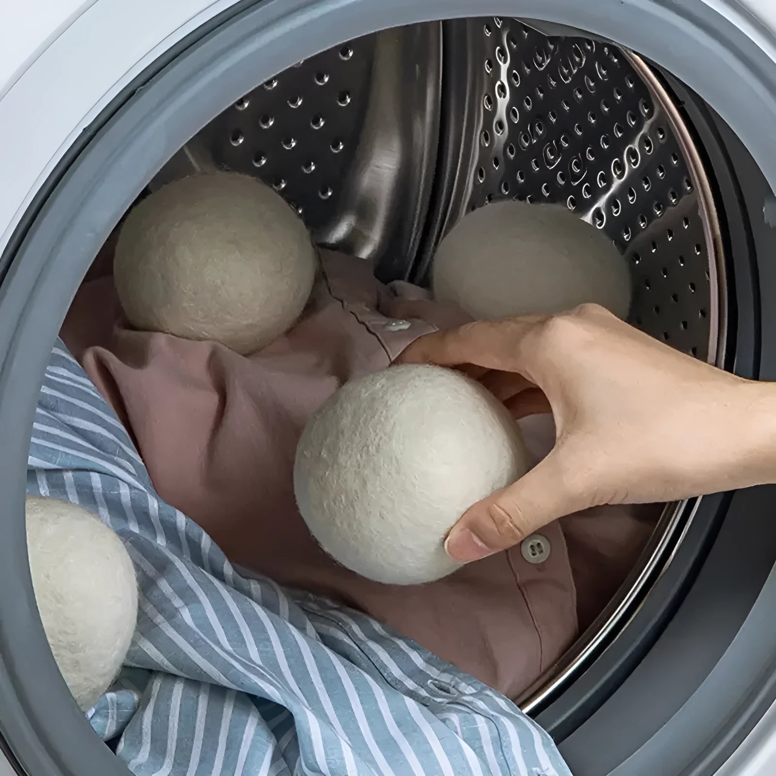 Set of six wool drying balls in three sizes 5cm 7cm 8cm for static reduction and chemical-free fabric softening