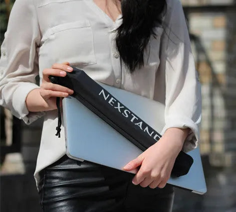 Black folding portable laptop computer stand made from reinforced nylon, shown in both folded and open positions.