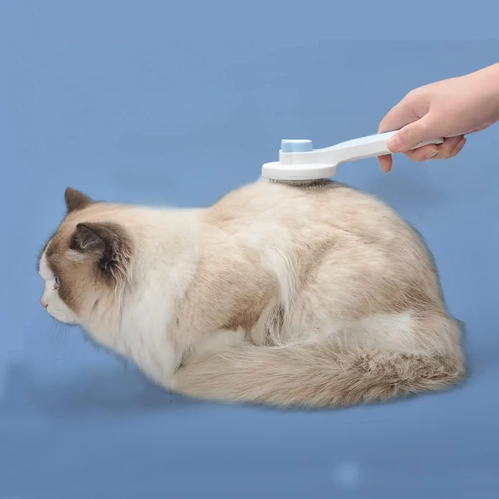 Blue self-cleaning pet grooming brush with rubber handle and metal pins with rubber tips.