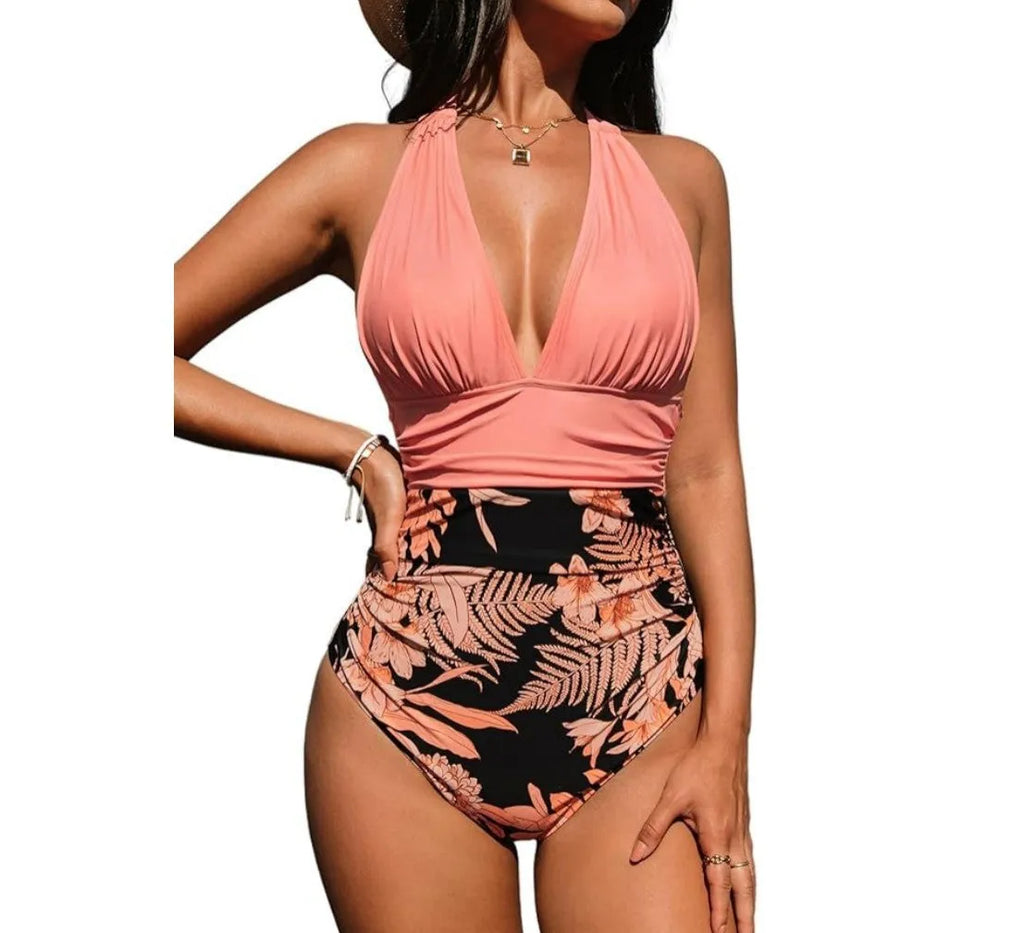 Women's backless halter neck one-piece swimsuit in quick-dry polyester, shown in a floral print