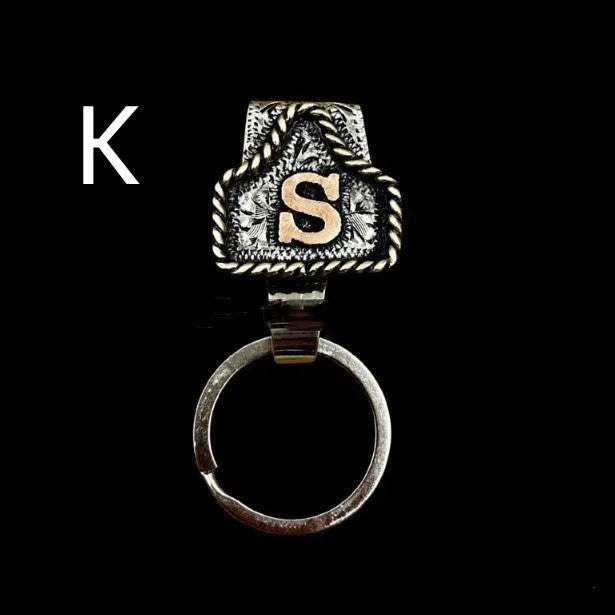 Handmade metal cow tag belt keychain in a selected colour from the A-Z letter range.
