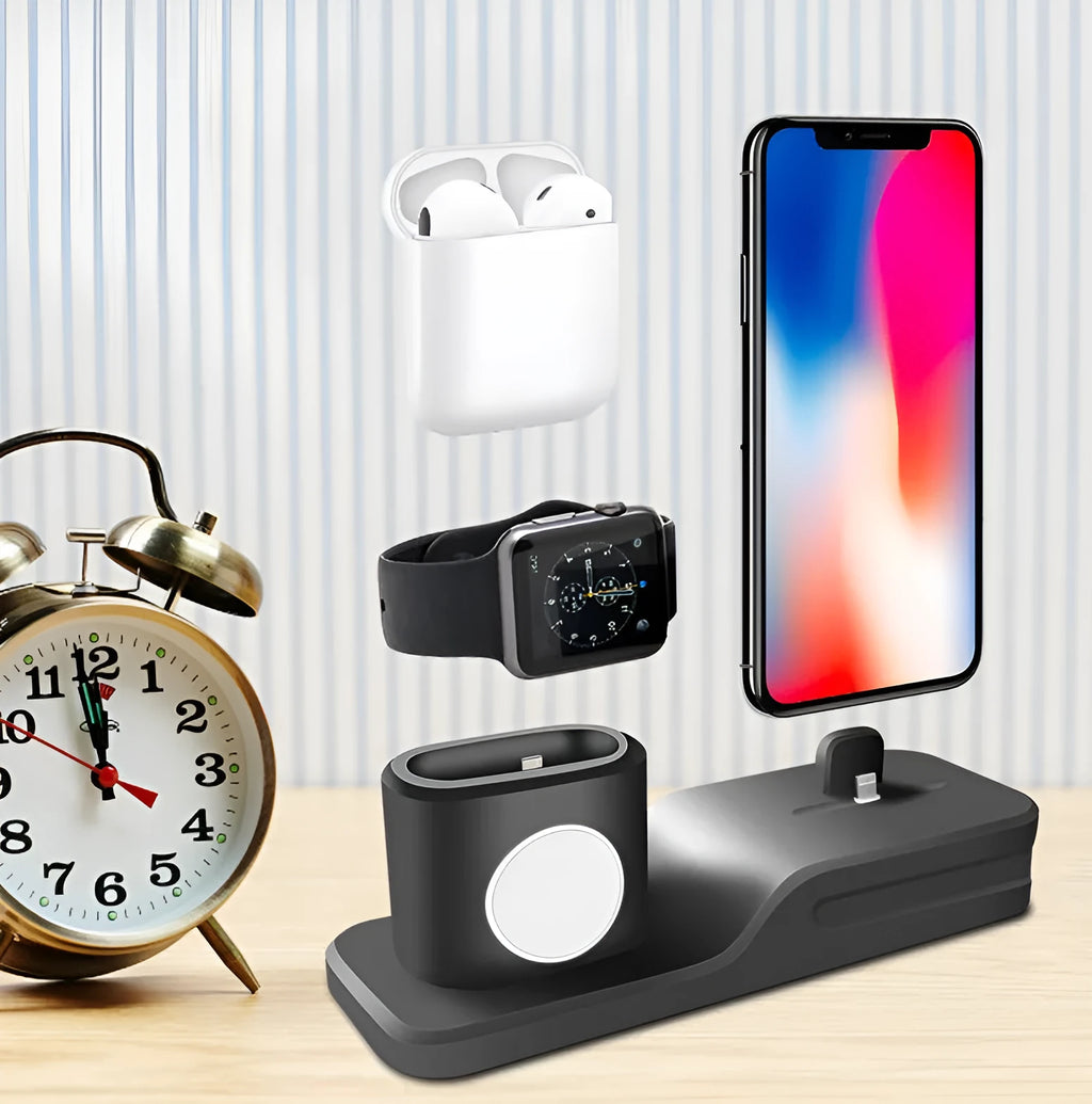 Black silicone 3-in-1 charging base for iPhone, iWatch, and AirPods on a plain surface