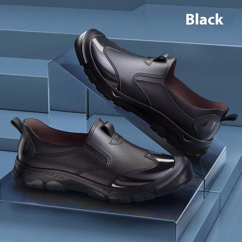 PVC outdoor wading boots in beige and black with red, showing round toe and non-slip plastic sole.
