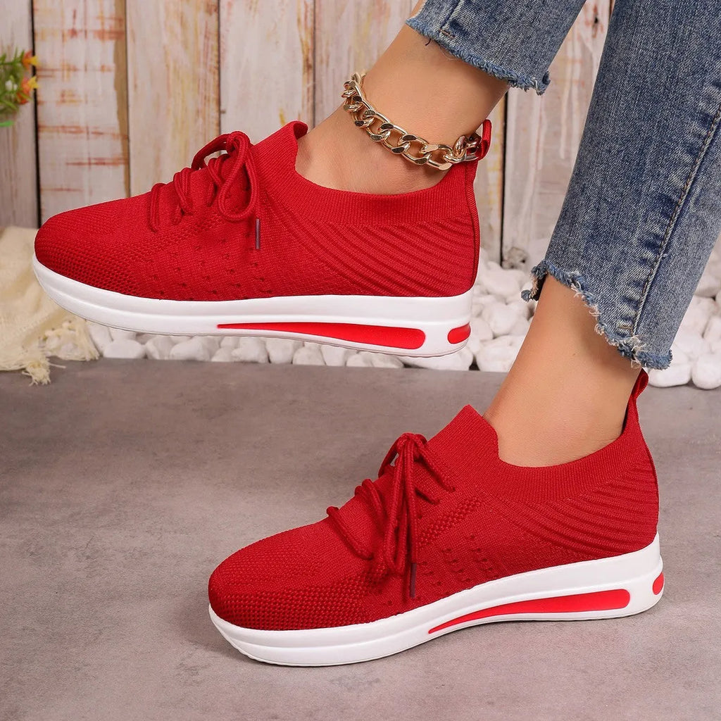 Women's low-top casual sneakers in black, blue, or red with round toe and lace-up front