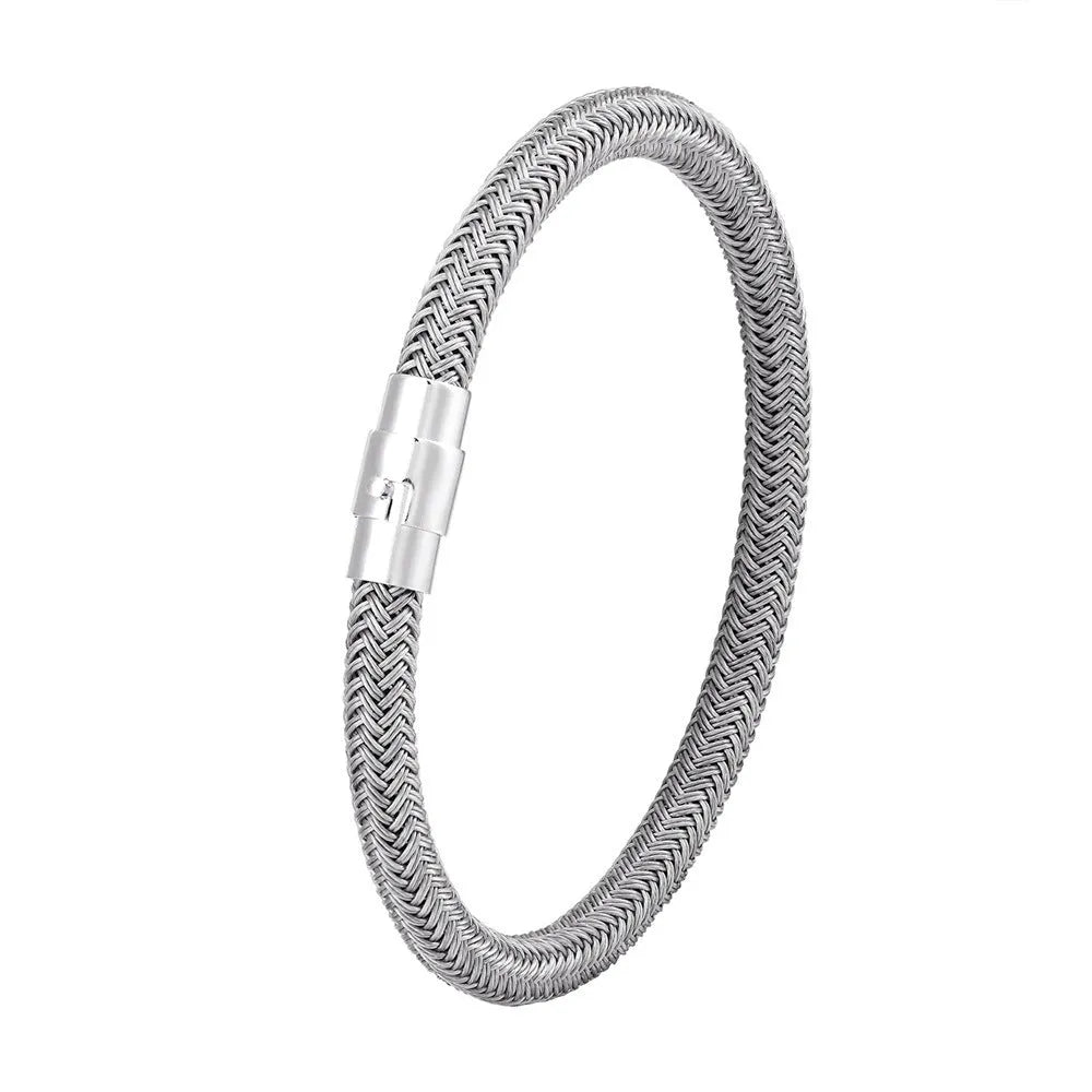 Geometric titanium steel bracelet with a magnetic clasp, shown in a unisex style.