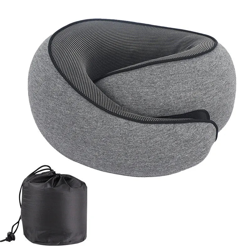 U-shaped memory foam travel neck pillow in light grey with a storage bag.