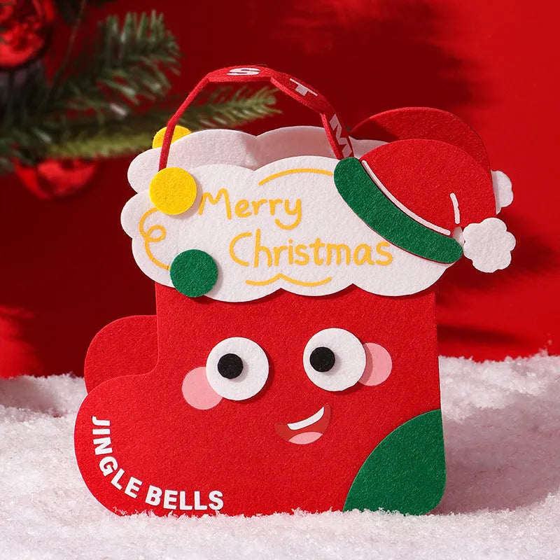Christmas felt gift bag in green with cartoon design, reusable small gift packaging