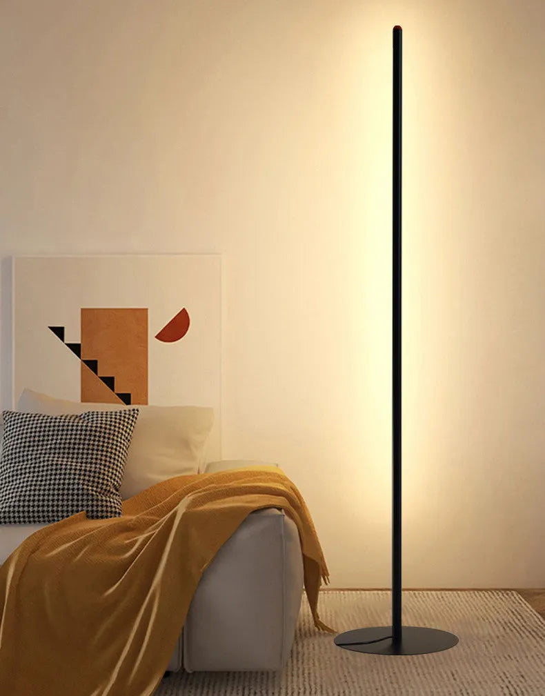 Simple vertical aluminium alloy floor lamp with LED light source on a modern stand.