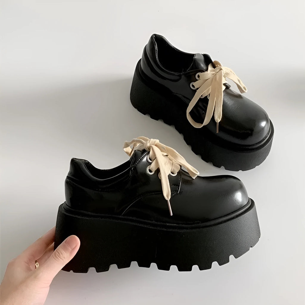 Matte black women's retro lace-up shoes with a chunky block heel and round toe.