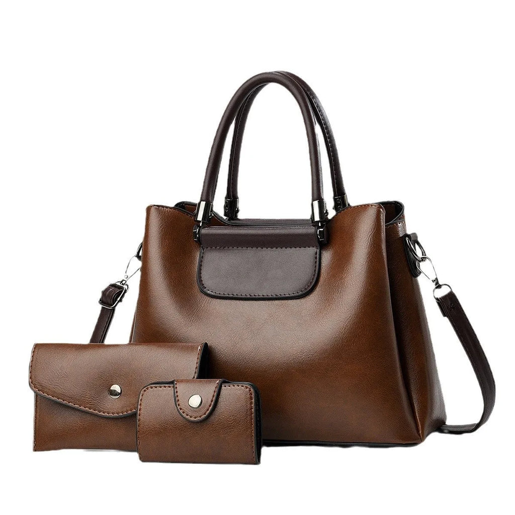 Women's PU handbag set with large tote, medium pouch, and small pouch in a square shape