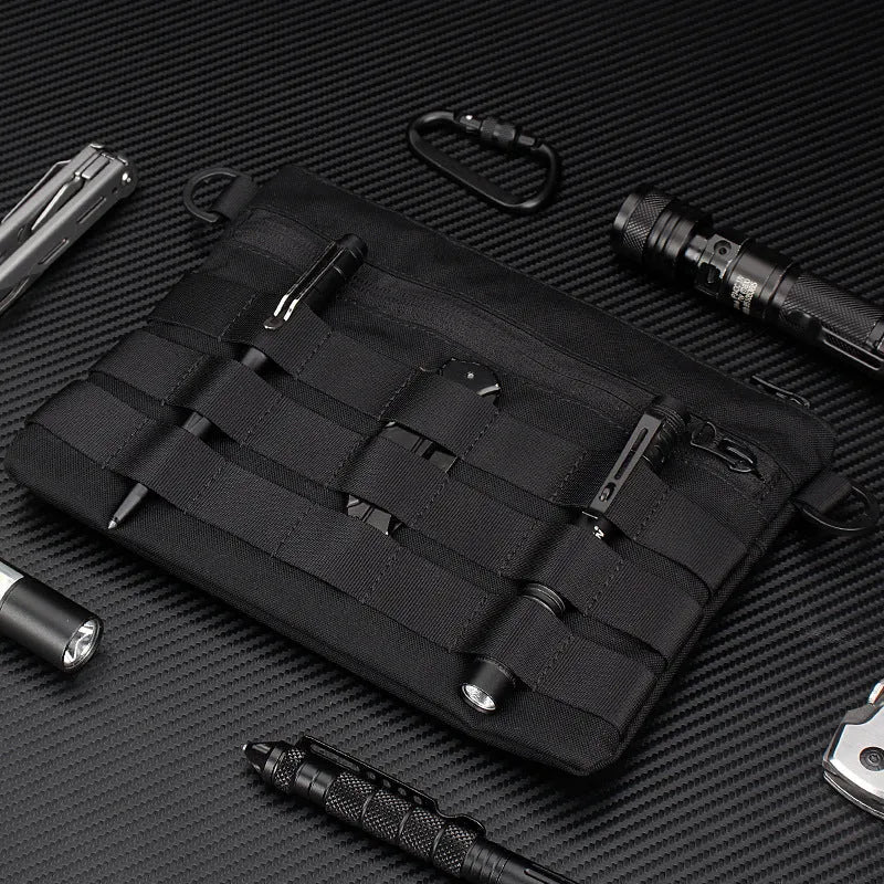 Black tactical waist pack made from Oxford cloth measuring 18cm by 3.5cm