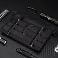 Black tactical waist pack made from Oxford cloth measuring 18cm by 3.5cm