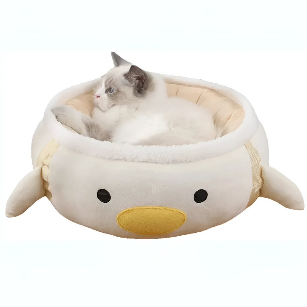Green chick-shaped cat bed that can be used flat or hung as a hammock for small pets.