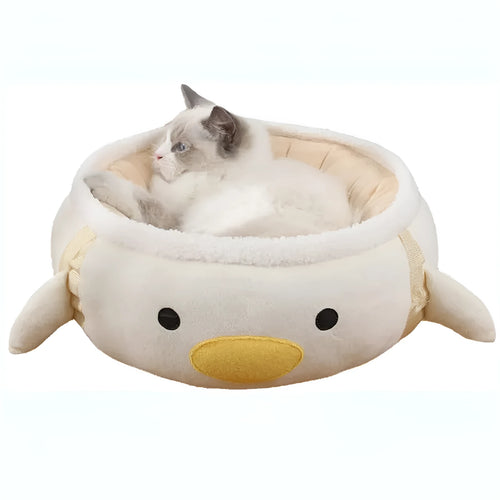 Green chick-shaped cat bed that can be used flat or hung as a hammock for small pets.