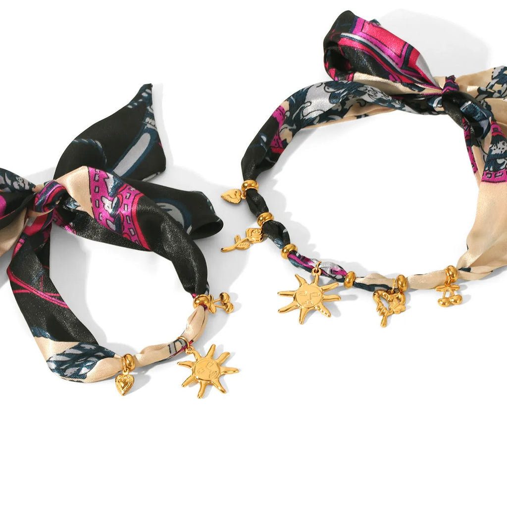 Children's stainless steel sunflower necklace and bracelet set in ins style on a light background