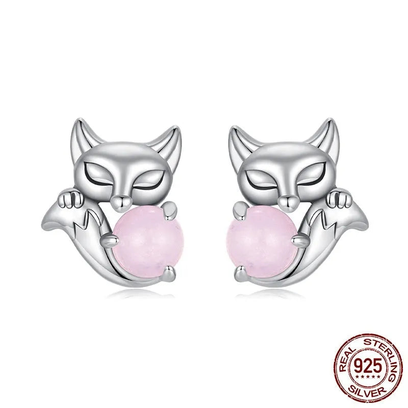 S925 sterling silver fox stud earrings with green jade inlay on white background